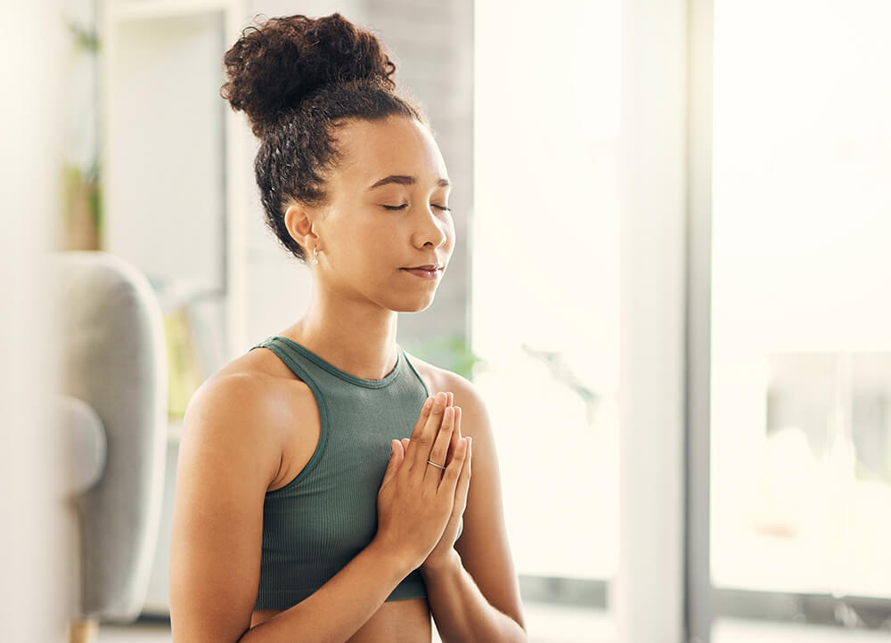 praying-hands-relax-meditation-by-woman-living-room-peace-wellness-mental-health-balance-home-prayer-pose-yoga-lady-meditate-lounge-zen-healing-holistic-exercise (1)